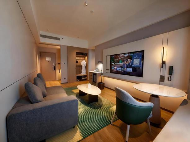 Imagen de la habitación del Hotel Holiday Inn and Suites Guangzhou South Station by IHG. Foto 5