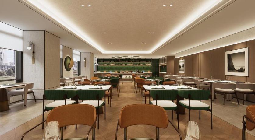 Imagen del bar/restaurante del Hotel Holiday Inn and Suites Guangzhou South Station by IHG. Foto 2