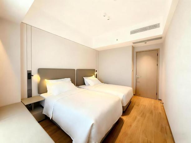 Imagen de la habitación del Hotel Holiday Inn and Suites Guangzhou South Station by IHG. Foto 7