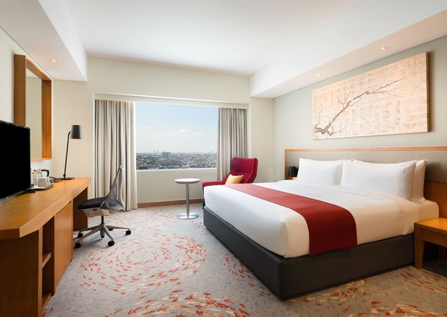 Imagen de la habitación del Hotel Holiday Inn and Suites Jakarta Gajah Mada. Foto 4