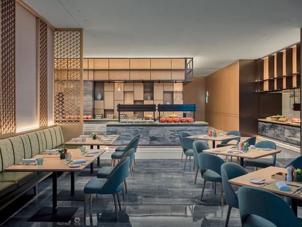 Imagen del bar/restaurante del Hotel Holiday Inn and Suites Kunshan Huaqiao, an IHG. Foto 2
