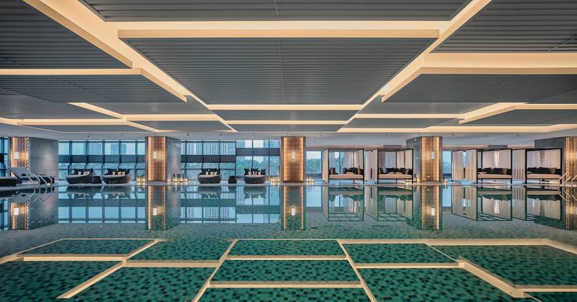 Imagen de la piscina del Hotel Holiday Inn and Suites Kunshan Huaqiao, an IHG. Foto 19