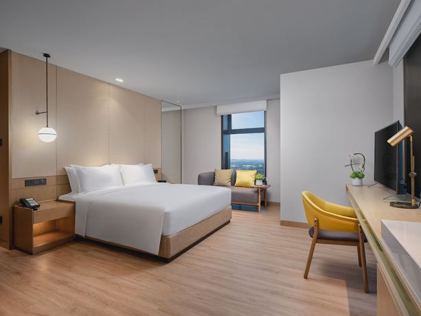 Imagen de la habitación del Hotel Holiday Inn and Suites Kunshan Huaqiao, an IHG. Foto 13