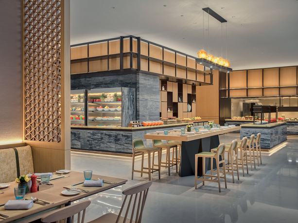 Imagen del bar/restaurante del Hotel Holiday Inn and Suites Kunshan Huaqiao, an IHG. Foto 3