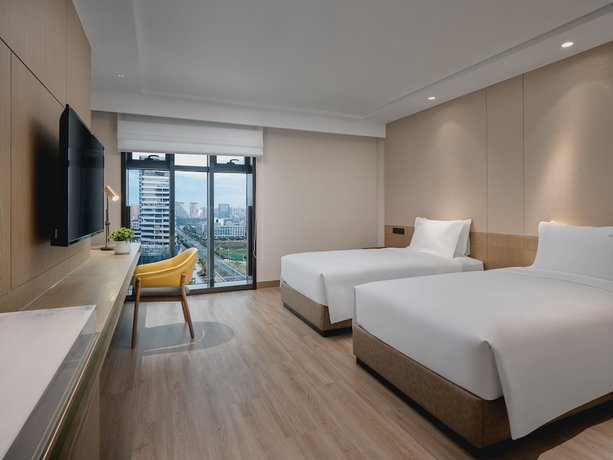 Imagen de la habitación del Hotel Holiday Inn and Suites Kunshan Huaqiao, an IHG. Foto 15