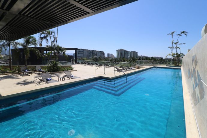 Imagen de la piscina del Hotel Holiday Inn and Suites Puerto Vallarta Marina and Golf, An Ihg. Foto 19