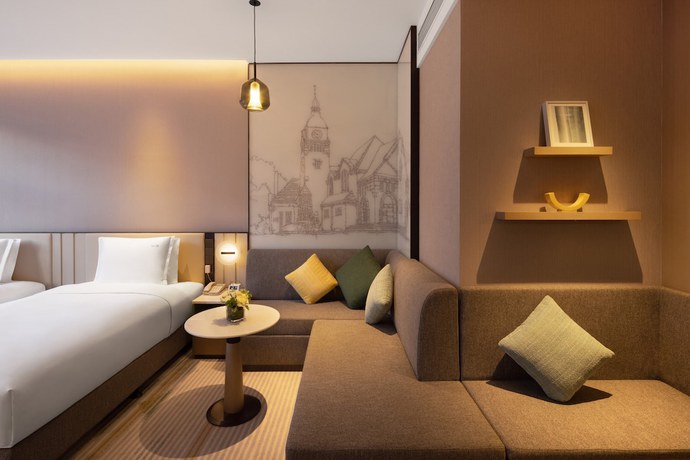 Imagen de la habitación del Hotel Holiday Inn and Suites Qingdao Jinshui, an IHG. Foto 1