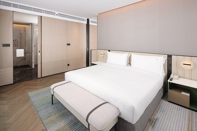 Imagen de la habitación del Hotel Holiday Inn and Suites Qingdao Jinshui, an IHG. Foto 8