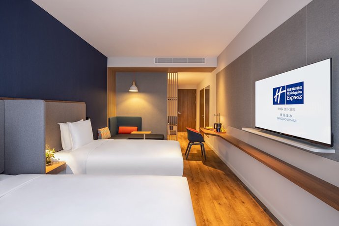 Imagen de la habitación del Hotel Holiday Inn and Suites Qingdao Jinshui, an IHG. Foto 11