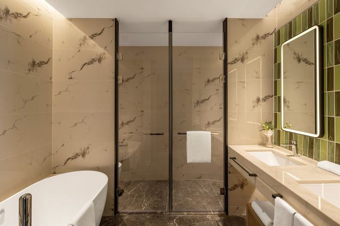 Imagen de la habitación del Hotel Holiday Inn and Suites Qingdao Jinshui, an IHG. Foto 12