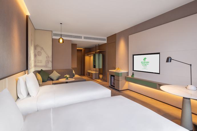 Imagen de la habitación del Hotel Holiday Inn and Suites Qingdao Jinshui, an IHG. Foto 13