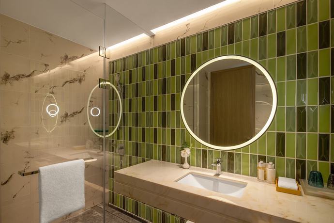 Imagen de la habitación del Hotel Holiday Inn and Suites Qingdao Jinshui, an IHG. Foto 14