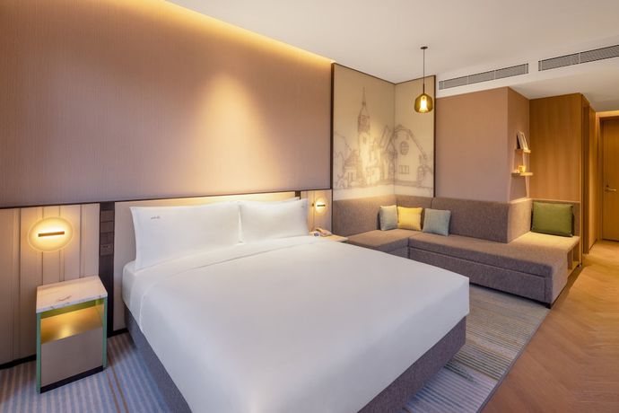 Imagen de la habitación del Hotel Holiday Inn and Suites Qingdao Jinshui, an IHG. Foto 15