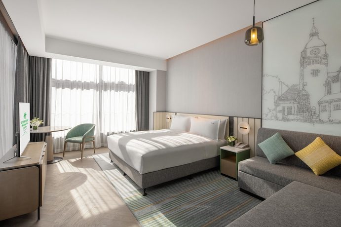 Imagen de la habitación del Hotel Holiday Inn and Suites Qingdao Jinshui, an IHG. Foto 16