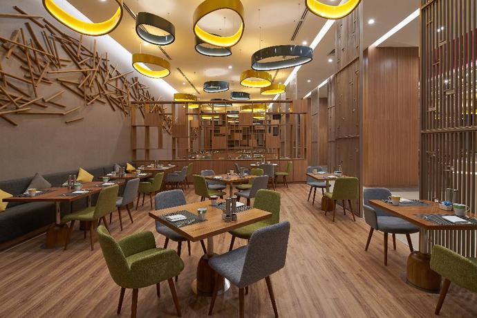 Imagen del bar/restaurante del Hotel Holiday Inn and Suites Saigon Airport, Tan Binh . Foto 7