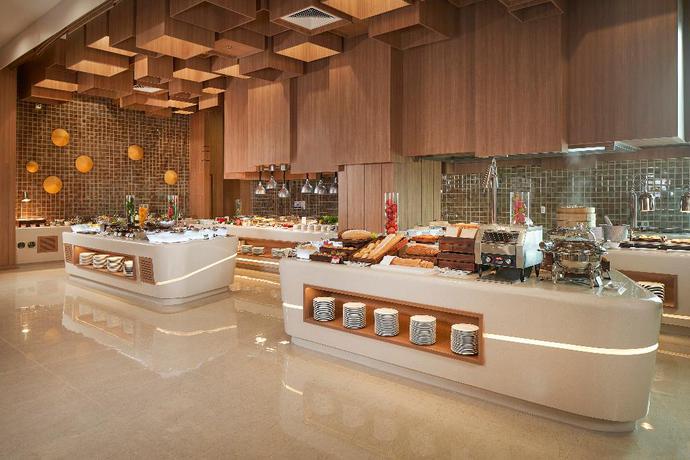 Imagen del bar/restaurante del Hotel Holiday Inn and Suites Saigon Airport, Tan Binh . Foto 8