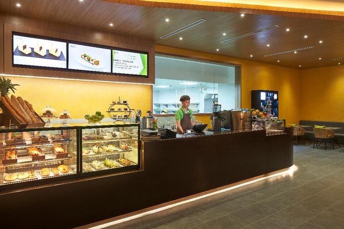 Imagen del bar/restaurante del Hotel Holiday Inn and Suites Saigon Airport, Tan Binh . Foto 10