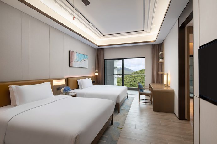 Imagen de la habitación del Hotel Holiday Inn and Suites Sanya Yalong Bay, an IHG. Foto 12