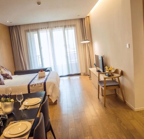Imagen de la habitación del Hotel Holiday Inn and Suites Suzhou Yangcheng Lake, An Ihg. Foto 12