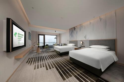 Imagen de la habitación del Hotel Holiday Inn and Suites Wuhan International Expo, an IHG Hotel. Foto 11