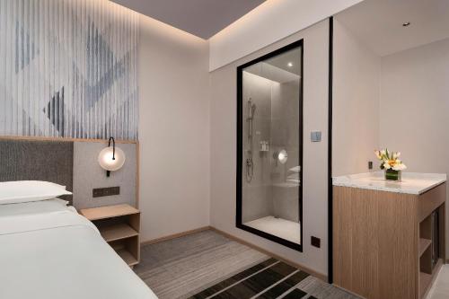 Imagen de la habitación del Hotel Holiday Inn and Suites Wuhan International Expo, an IHG Hotel. Foto 14