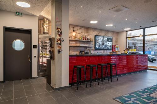 Imagen del bar/restaurante del Hotel Holiday Inn - the niu, Keg Hamburg Ost by IHG. Foto 6