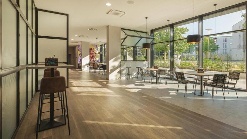 Imagen del bar/restaurante del Hotel Holiday Inn - the niu, Leo Nuremberg by IHG. Foto 3