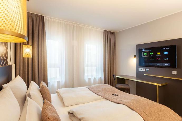 Imagen de la habitación del Hotel Holiday Inn - the niu, Mesh Stuttgart Messe by IHG. Foto 17