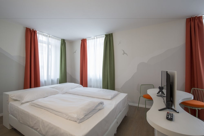 Imagen de la habitación del Hotel Holiday Iv Gardan. Foto 9