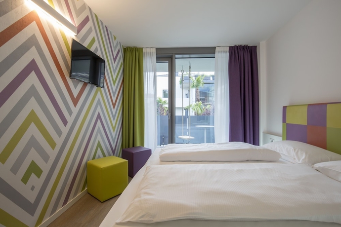 Imagen de la habitación del Hotel Holiday Iv Gardan. Foto 10