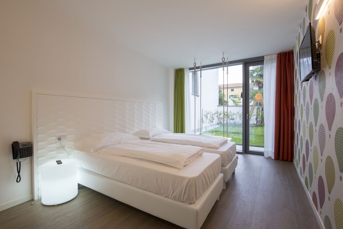 Imagen de la habitación del Hotel Holiday Iv Gardan. Foto 11