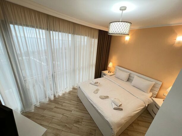 Imagen de la habitación del Hotel Holiday Lux Sea Towers Batumi. Foto 16