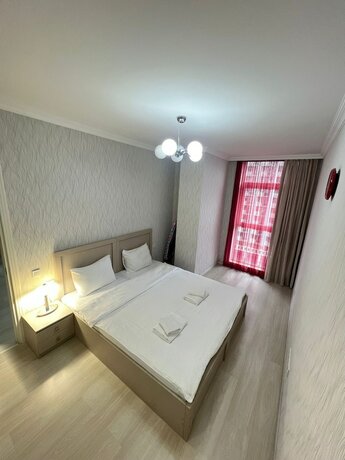 Imagen de la habitación del Hotel Holiday Lux Sea Towers Batumi. Foto 19