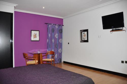 Imagen de la habitación del Hotel Holiday, Nigr&aacute;n. Foto 6