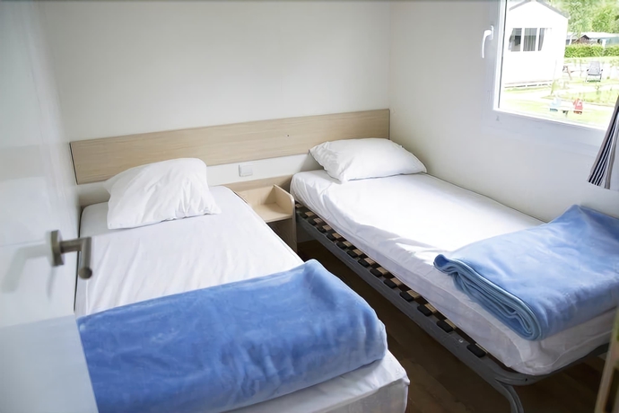 Imagen de la habitación del Hotel Holiday Park Klein Strand. Foto 9