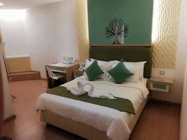 Imagen de la habitación del Hotel Holiday Place. Foto 2