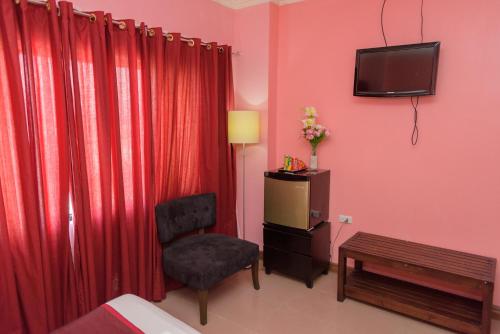 Imagen de la habitación del Hotel Holiday Plaza, Laoag. Foto 5