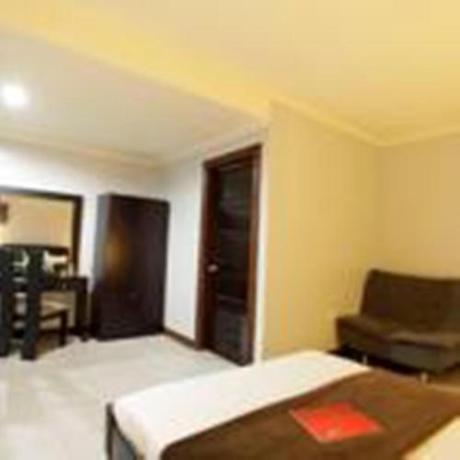 Imagen de la habitación del Hotel Holiday Plaza, Laoag. Foto 7