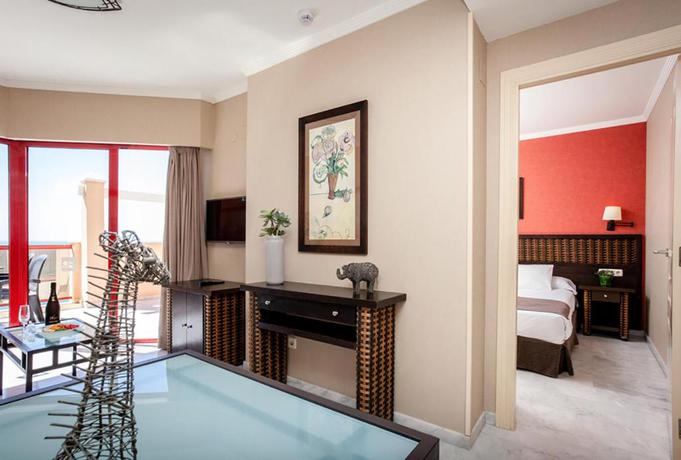 Imagen de la habitación del Hotel Holiday Premium Resort. Foto 7