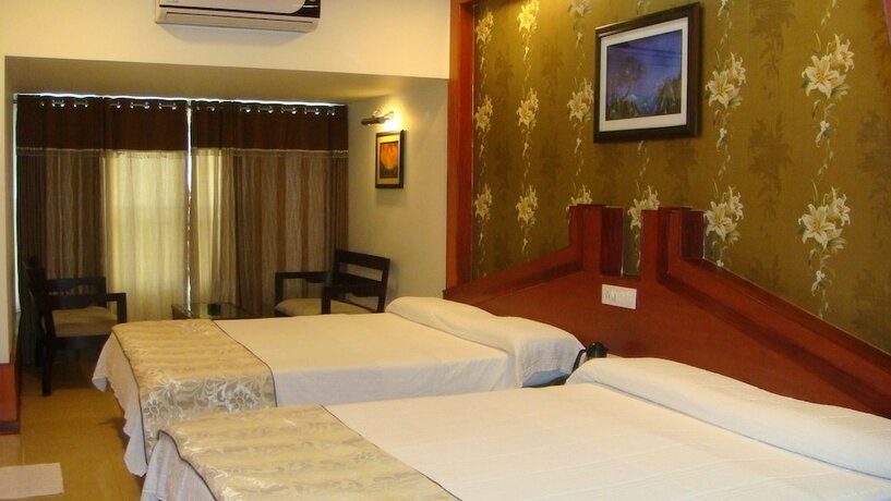 Imagen de la habitación del Hotel Holiday Resort. Foto 13