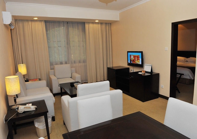 Imagen de la habitación del Hotel Holiday Resort, Zhuhai. Foto 2