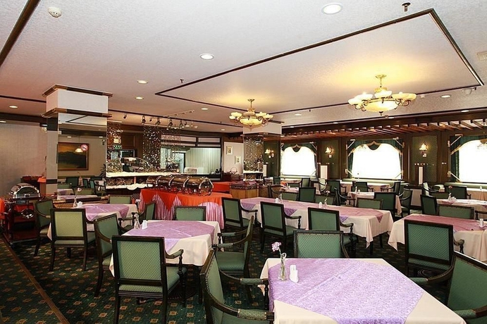 Imagen del bar/restaurante del Hotel Holiday Resort, Zhuhai. Foto 1