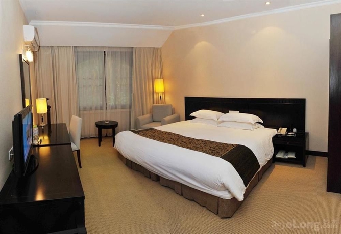 Imagen de la habitación del Hotel Holiday Resort, Zhuhai. Foto 11