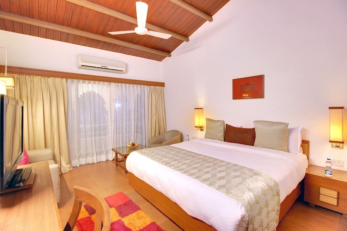 Imagen de la habitación del Hotel Holiday Resort and Spa A Unit of S Poddar Group. Foto 5