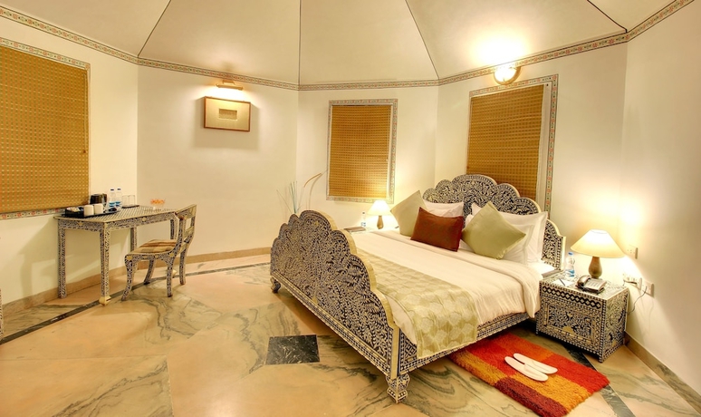 Imagen de la habitación del Hotel Holiday Resort and Spa A Unit of S Poddar Group. Foto 11