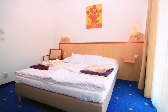 Imagen de la habitación del Hotel Holiday Resorts. Foto 3