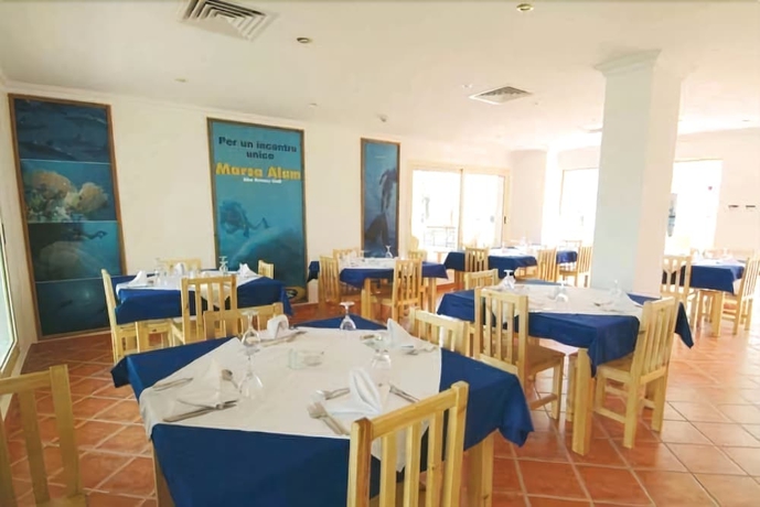 Imagen del bar/restaurante del Hotel Holiday Service College and Diving. Foto 3