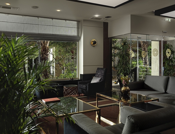 Imagen de los interiores del Hotel Holiday Suites, Atenas. Foto 19
