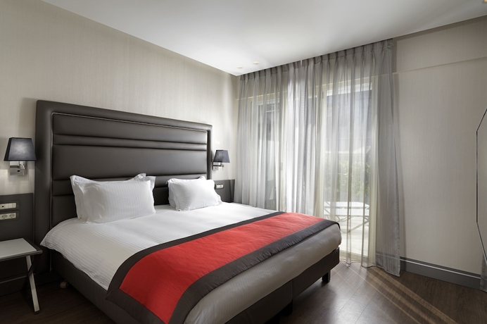 Imagen de la habitación del Hotel Holiday Suites, Atenas. Foto 5
