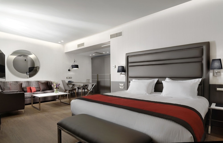 Imagen de la habitación del Hotel Holiday Suites, Atenas. Foto 6